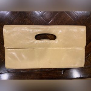 Medium sized clutch bag. Yellow/beige